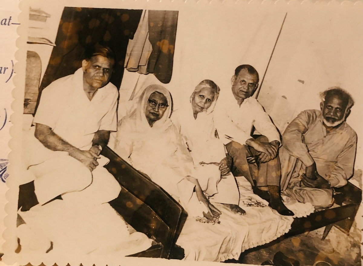 A vintage family portrait of elders seated together